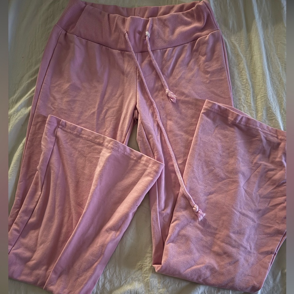 Pink flare leggings/sweatpants.